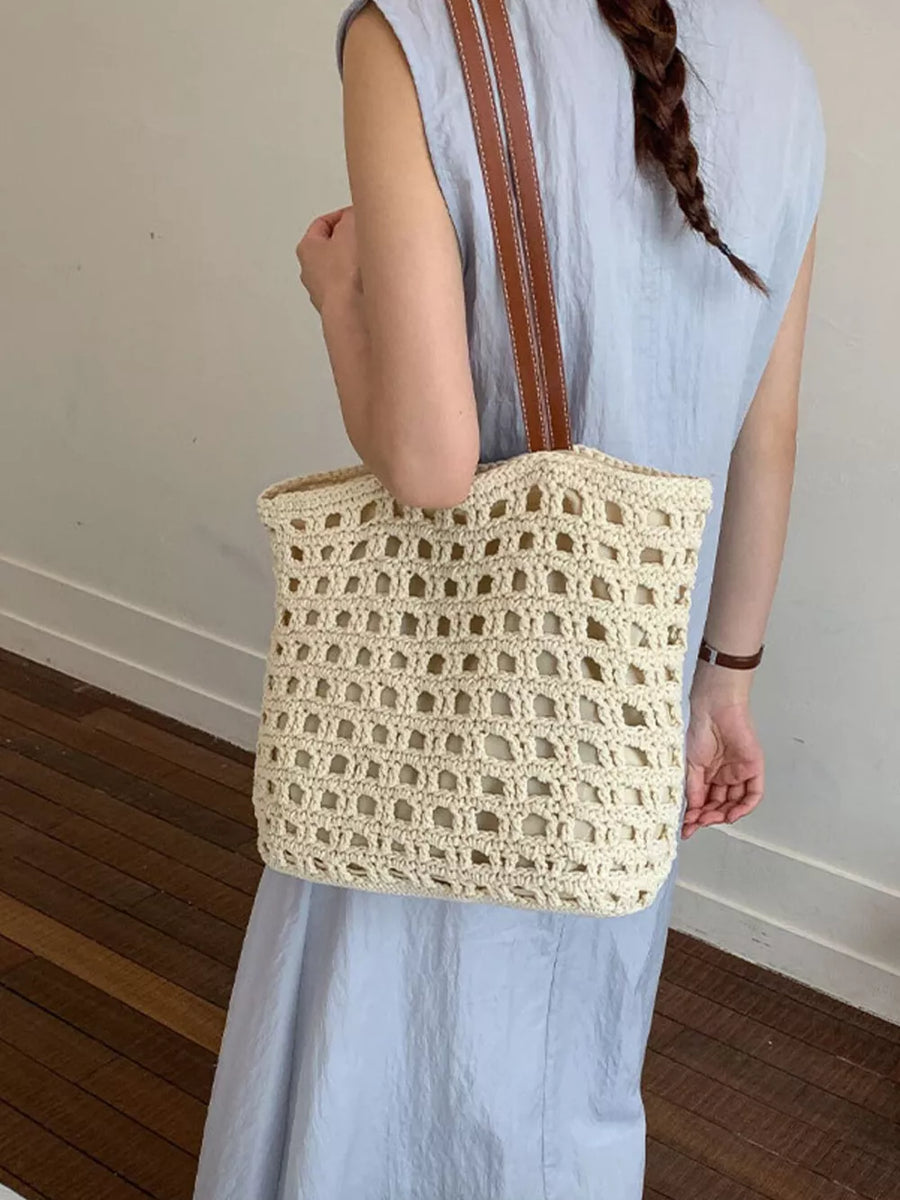 handbag in Cream White with woven construction and medium