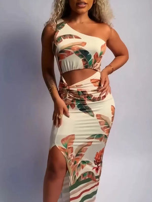 Tropical cutout maxi dress with one shoulder, side slit, and ruched detail.
