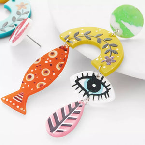 teal earrings featuring dangle and abstract-print