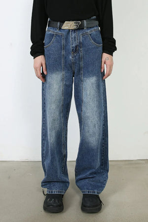 Panel seam wide leg denim jeans in medium blue wash with a relaxed fit.