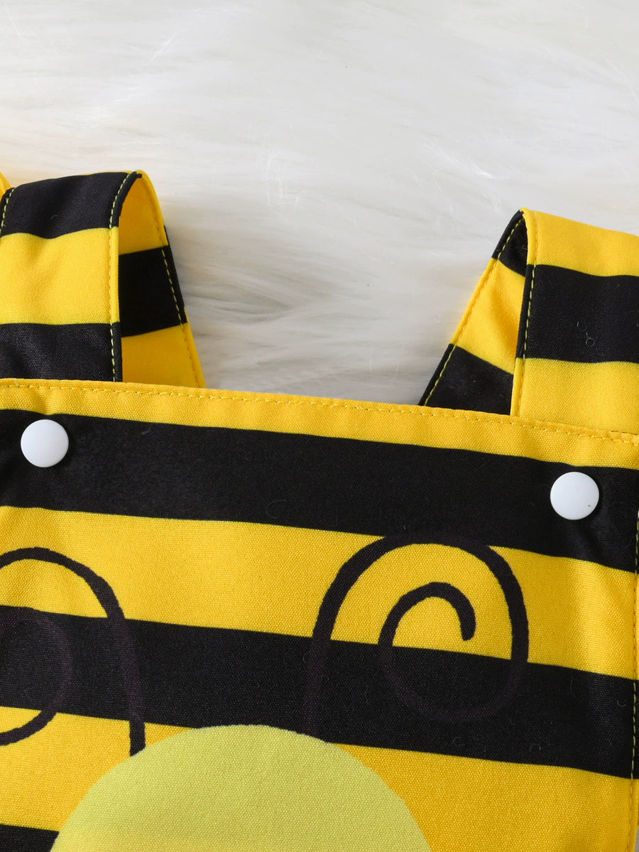 Baby bodysuit dress with yellow and black bee stripes, featuring a round appliqué and ruffle trim.