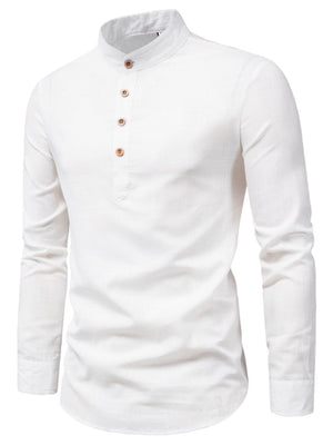 White linen henley shirt with long sleeves and four wooden buttons.