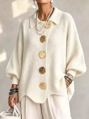 cardigan in cream featuring buttoned and relaxed fit