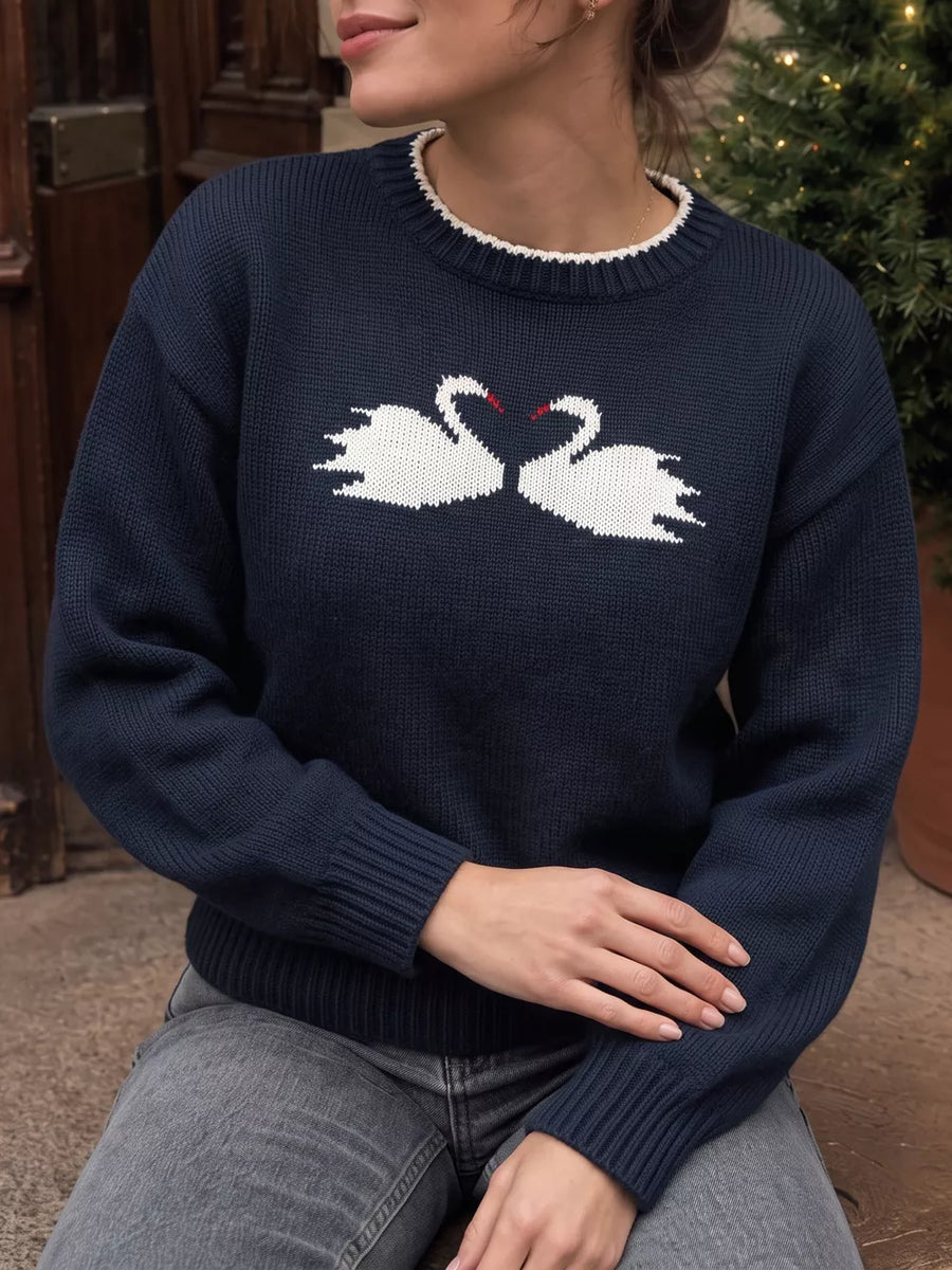 100% acrylic Care instructions: Machine wash cold pullover sweater in white with relaxed silhouette