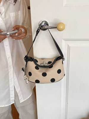 cream shoulder bag with turn-lock and polka-dot