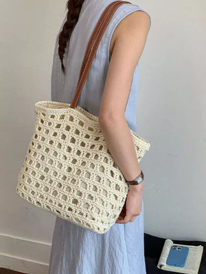 handbag in cream with woven construction and medium