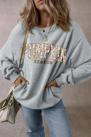 light gray sweatshirt with floral and crew neck