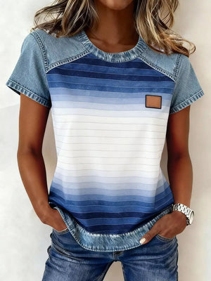 Denim patchwork blouse with ombre blue stripes and a faux leather patch.