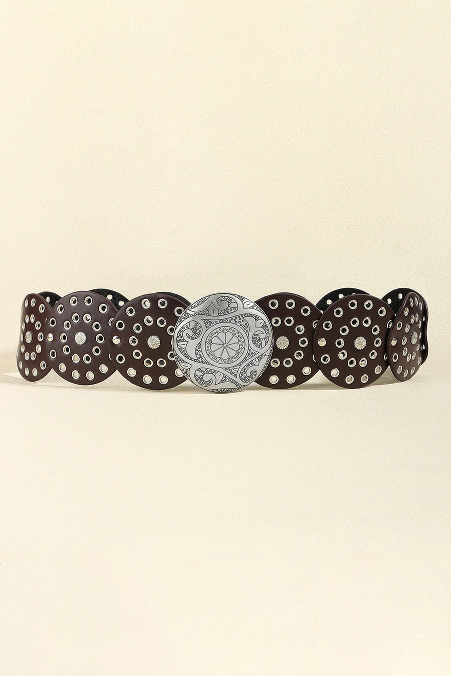 Disc-embellished statement belt in silver/coffee with a large, ornate silver buckle.