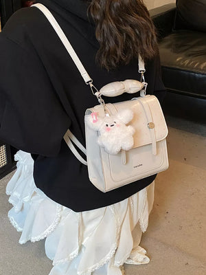 backpack in Cream White with flap closure and mini