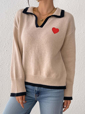 100% polyester Care instructions: Machine wash cold pullover sweater in black with relaxed silhouette