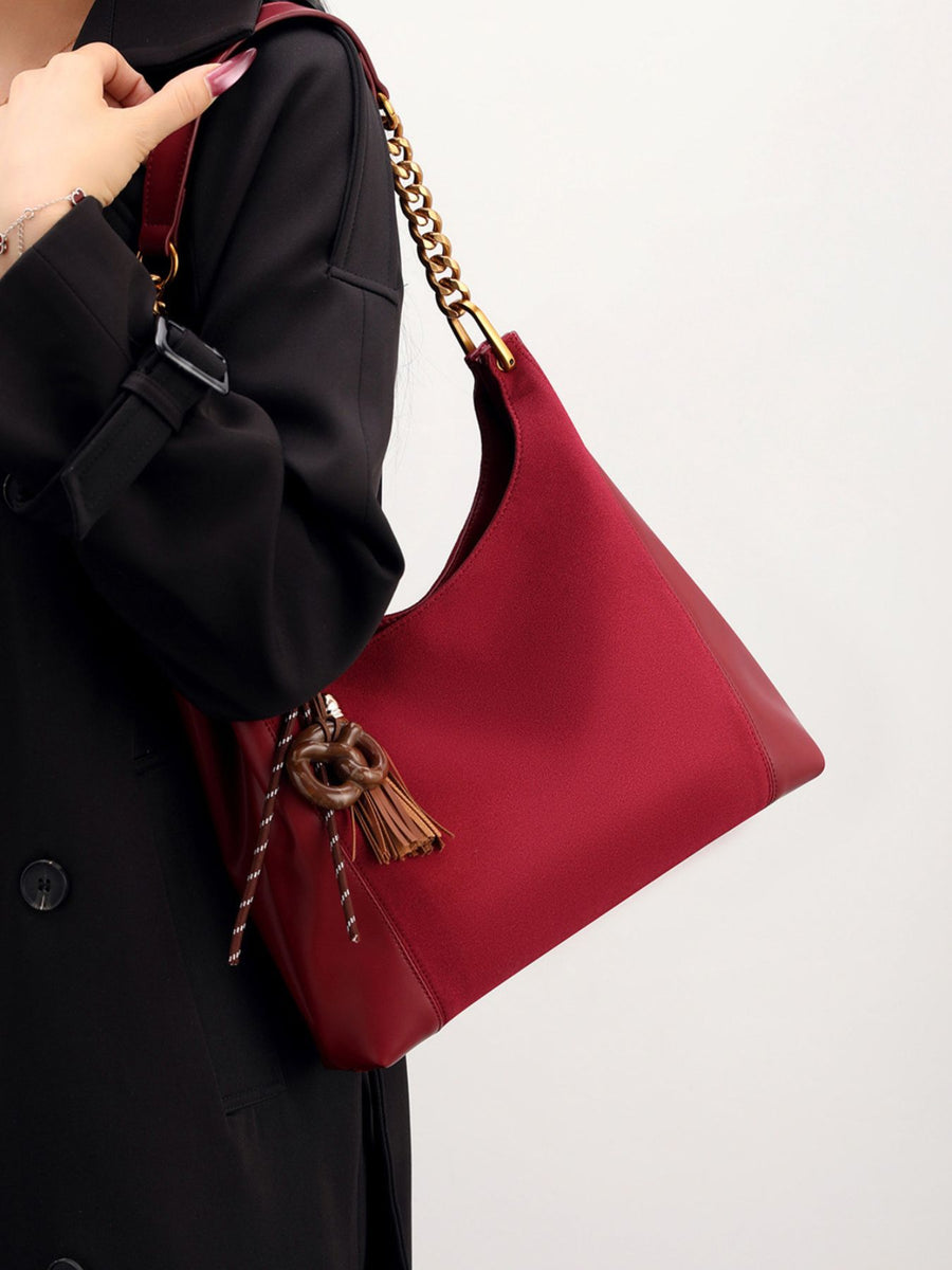 Suede Imported Size & shoulder bag in burgundy with slouchy silhouette