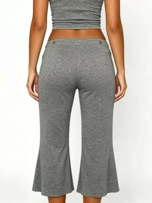 Light gray maternity capri pants with flared hem and button detail