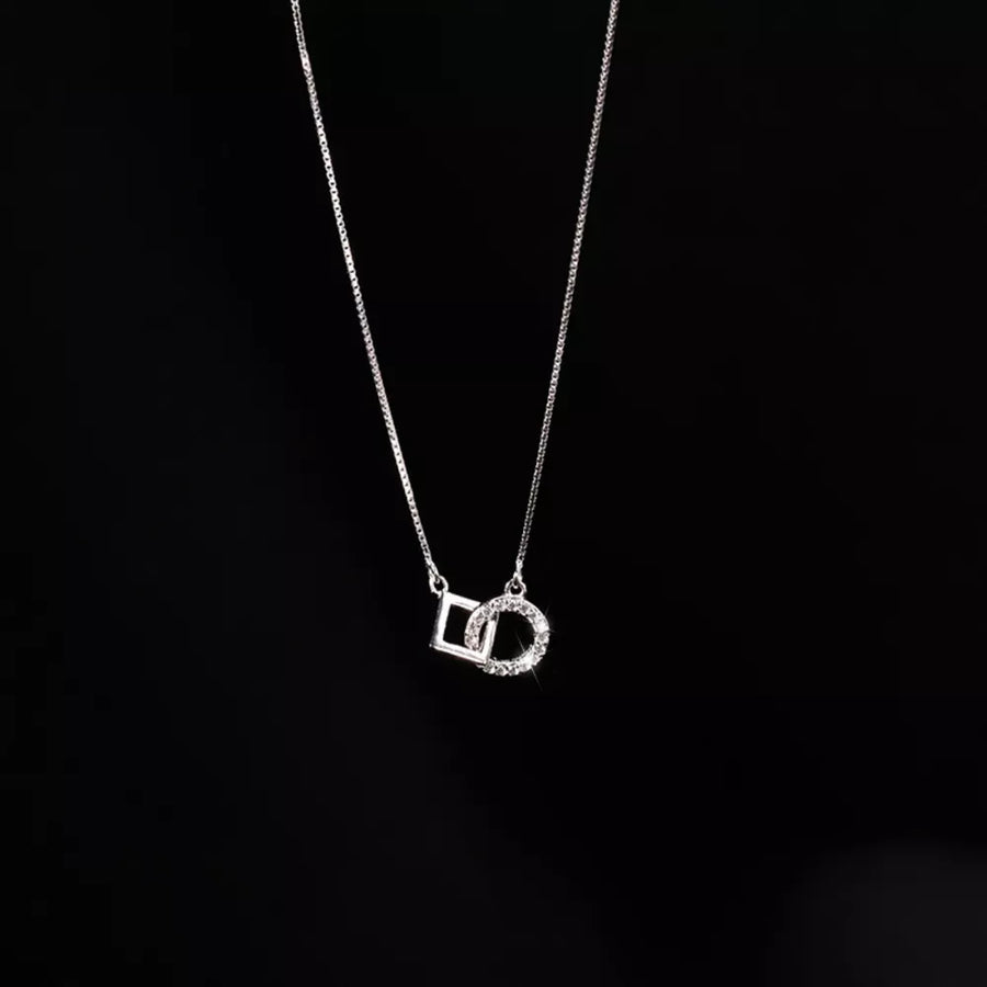 necklace in clear with geometric and zircon embellishment