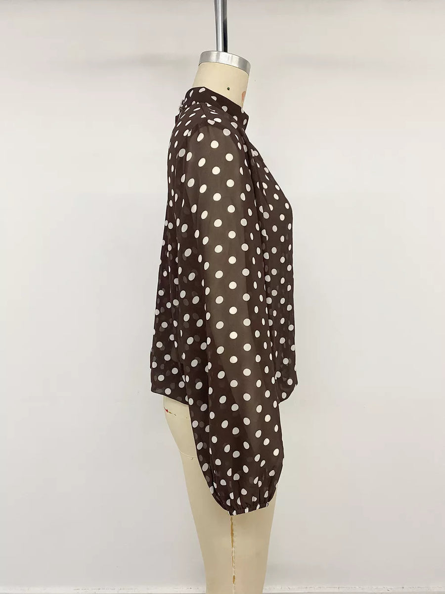 blouse in white with polka dot and buttoned