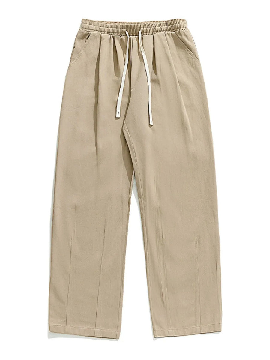 Khaki wide-leg pleated trousers with drawstring waist and pockets