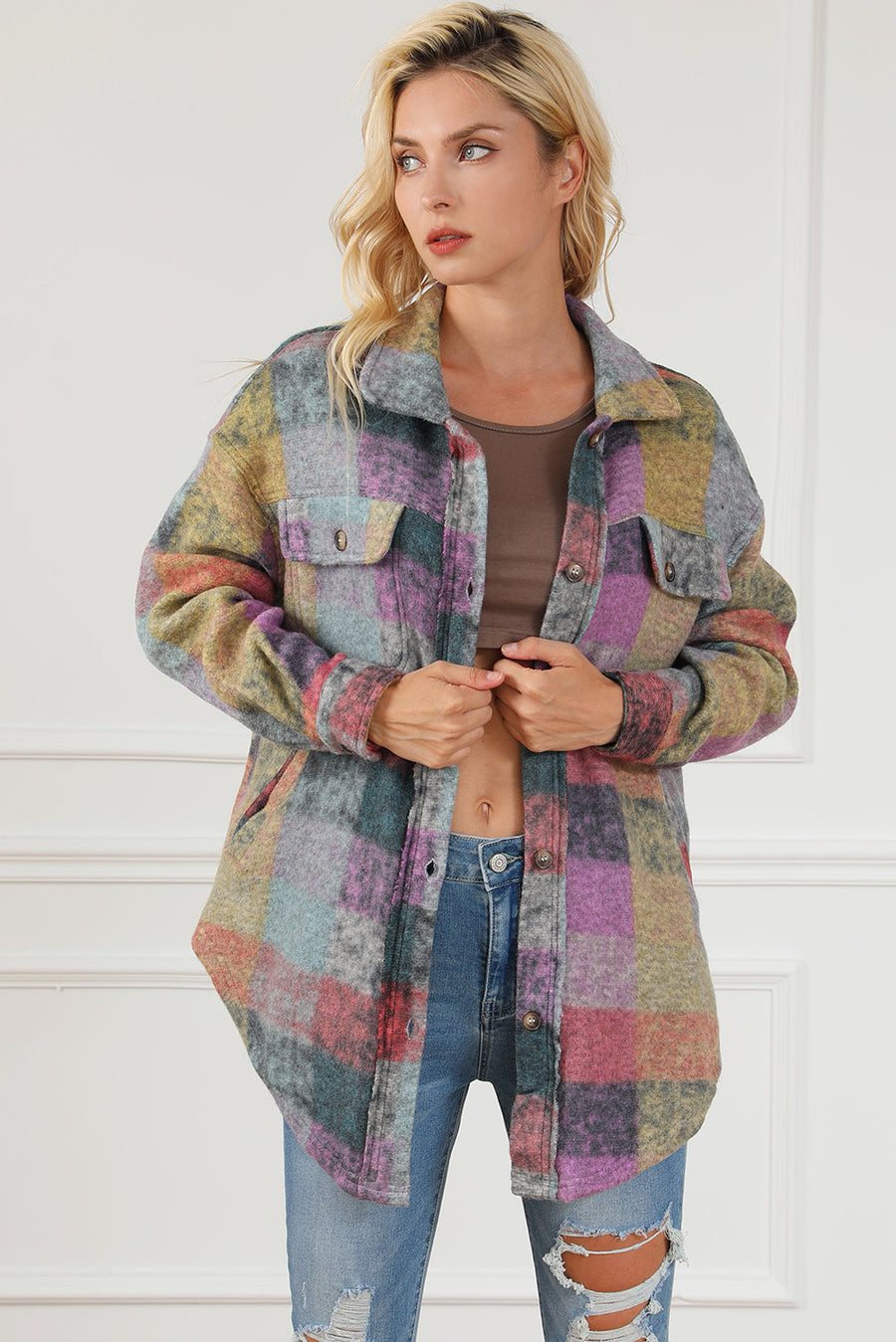 Multicolor brushed plaid shacket with collar and chest pockets.