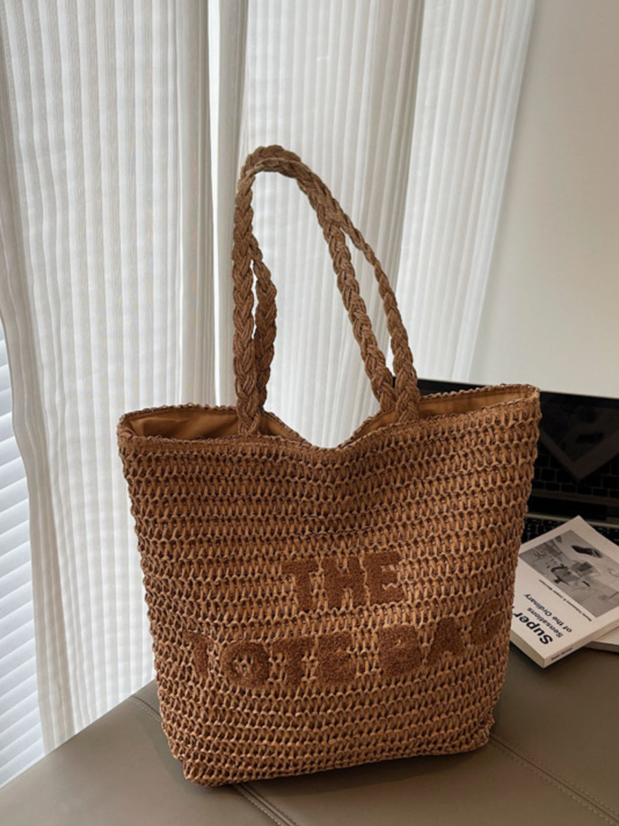 tote in tan featuring woven texture and boxy fit