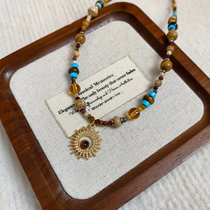 necklace featuring motif in turquoise with 18K Gold-Plated, Natural stone, Titanium Steel, Beads Care instructions: Avoid w