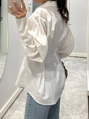 white button-down shirt with hip-length and button-front