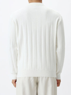 Black zip-up sweater with quarter-zip and ribbed