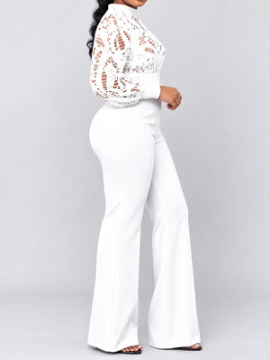 The main fabric contains 50% to less than 70% polyester jumpsuit in Blue with flared silhouette