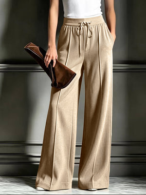 wide-leg pants in camel featuring tied and flared fit