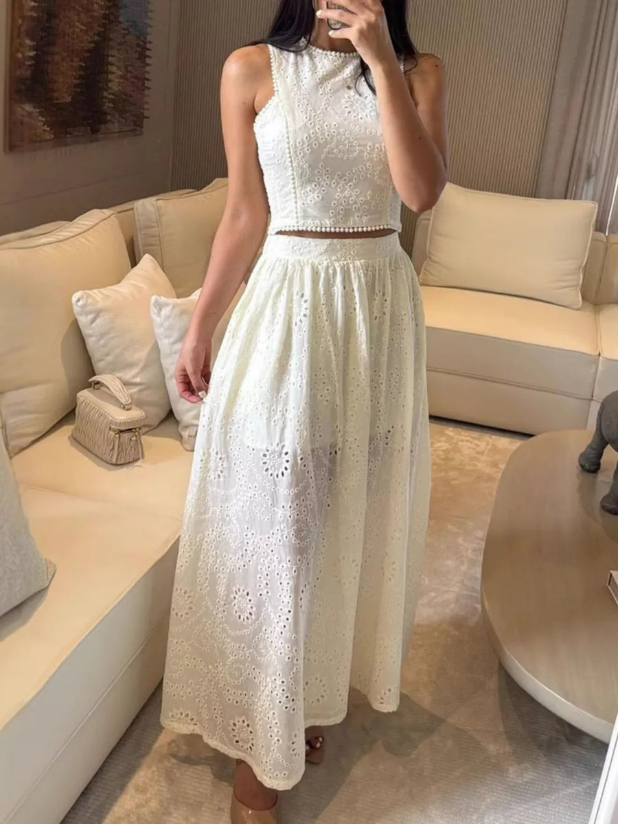 White eyelet cropped top and maxi skirt set with pearl trim detail.