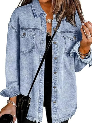 denim jacket in light blue featuring buttoned and relaxed fit