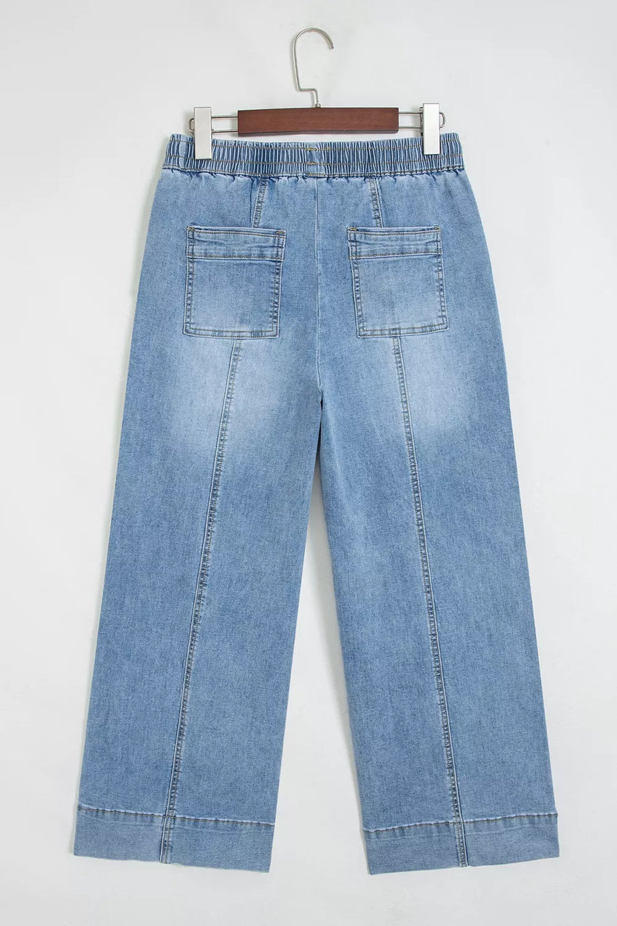 wide-leg jeans in light blue with drawstring waist and ankle-length