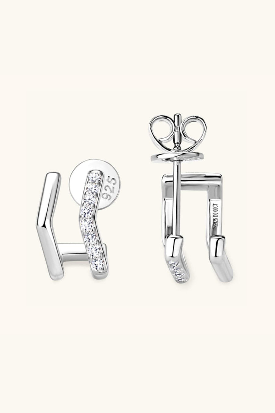 Geometric pavé silver ear jackets with 925 sterling silver and cubic zirconia accents.