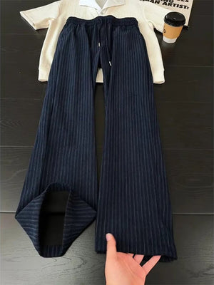 gray wide-leg pants featuring drawstring waist and striped