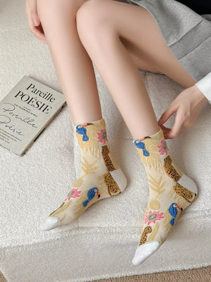 pale yellow socks with leopard-print, toucan, floral and N/A