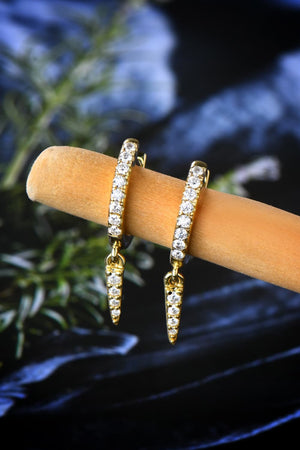 Gold pavé spike huggie earrings with clear stones