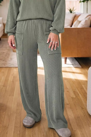 75% polyester, 20% viscose, 5% elastane Care instructions: Machine wash cold lounge set in sage green with relaxed silhouette