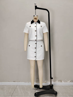 95% polyester, 5% spandex Care instructions: Machine wash cold two-piece set in White with fitted silhouette