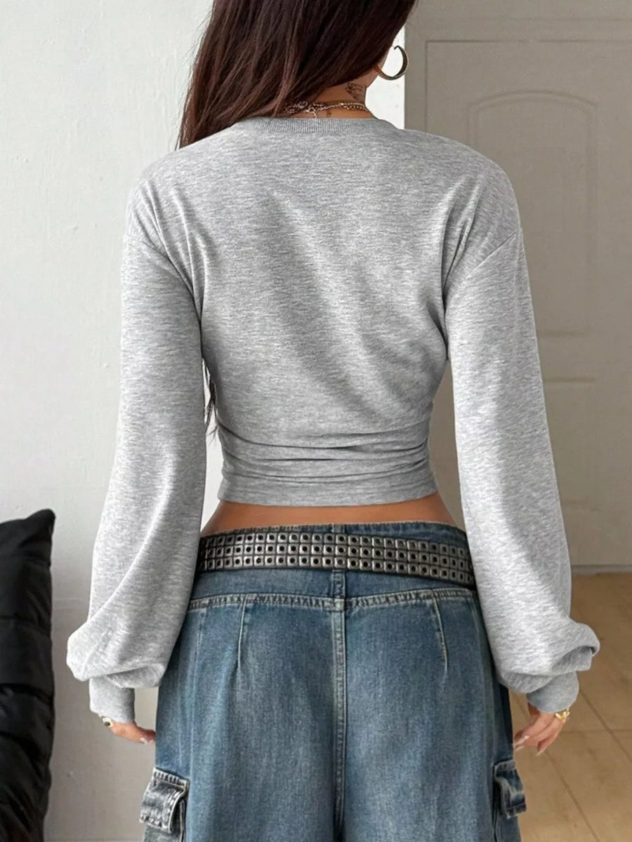 Black crop top with ruched and long sleeve