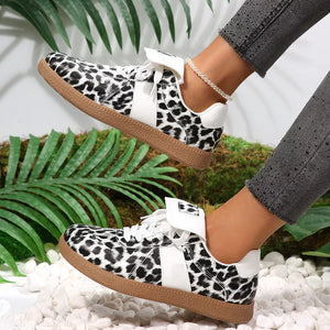 black sneakers with lace-up and not applicable