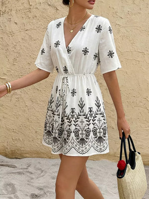 Printed Surplice Half Sleeve Romper in White