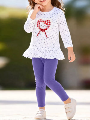 white peplum top with polka dot and round neck