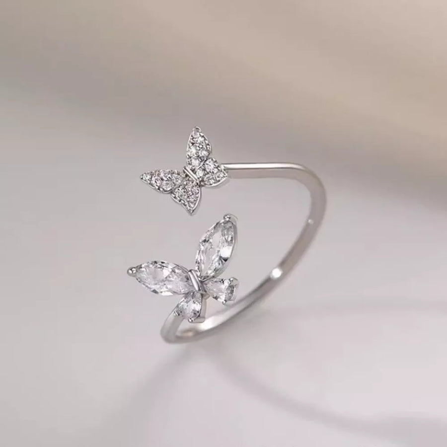 clear ring featuring adjustable and butterfly