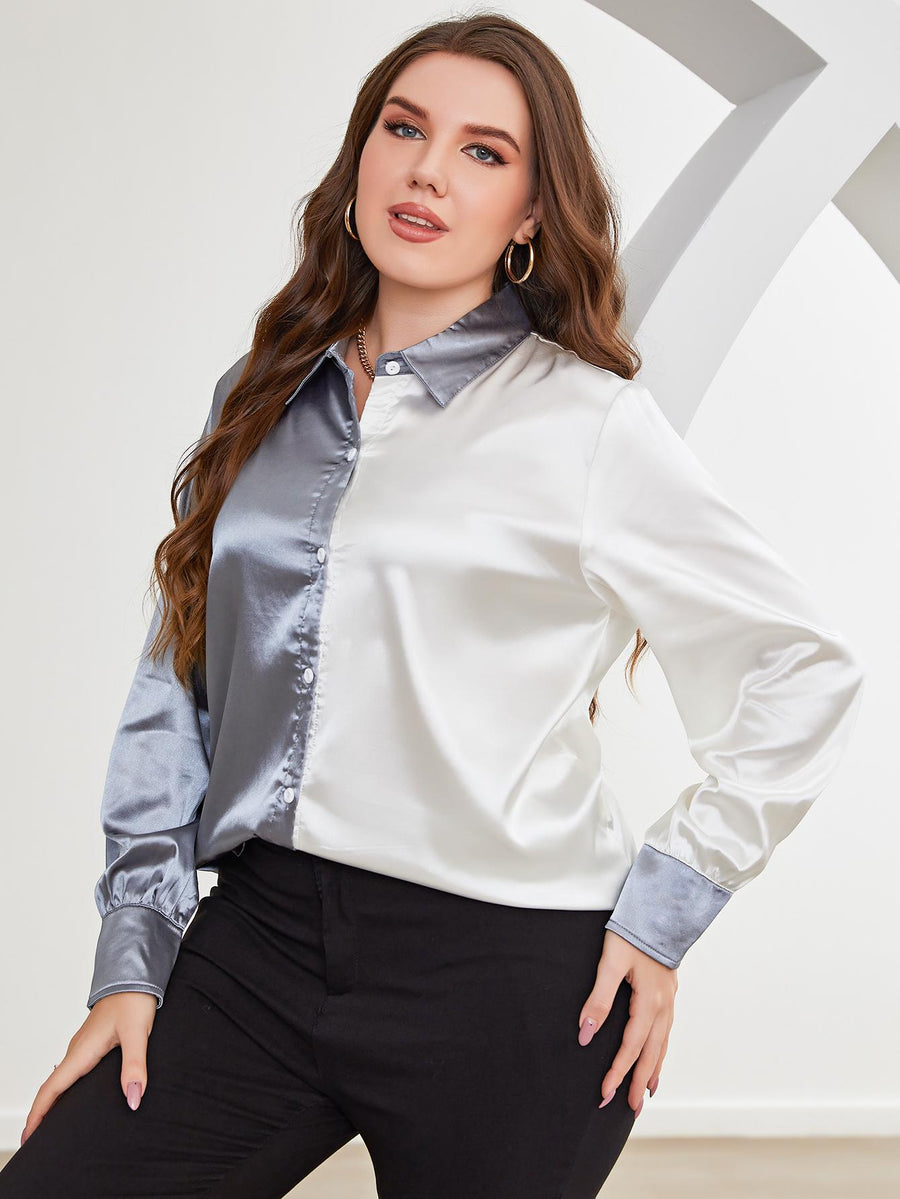Satin split-tone button-down blouse in light blue and white with a collared neckline and long sleeves.