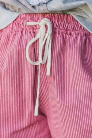 Pink striped denim shorts with elastic waist and drawstring