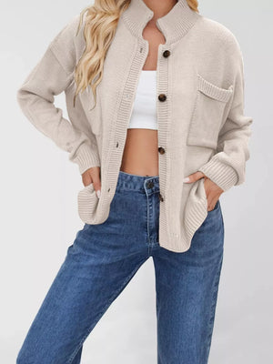 cardigan in light beige featuring buttoned and oversized fit