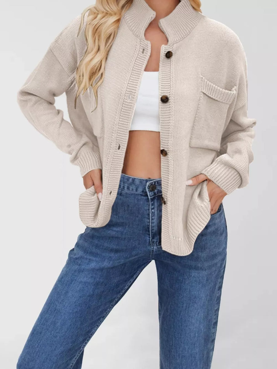 cardigan in light beige featuring buttoned and oversized fit