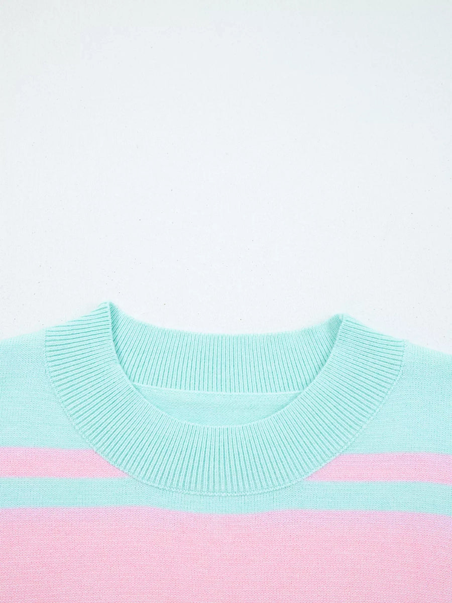 Multicolor striped cropped sweater with ribbed crew neck and cuffs.