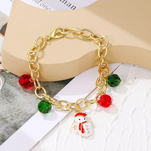 bracelet in gold with figural and charm