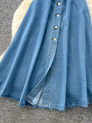 Blue denim a-line dress with button placket and side slit