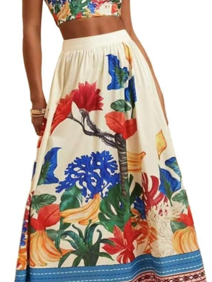 Floral print maxi skirt with a high waist and colorful tropical motifs.