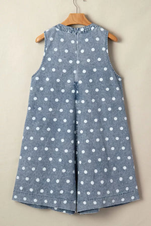 Denim polka dot romper with a tie-front detail and a high neckline.